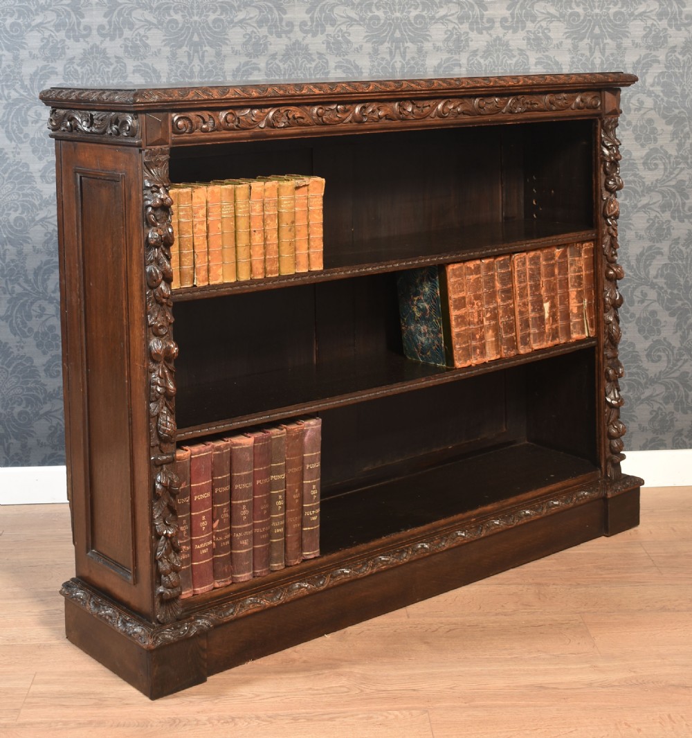 Carved oak open bookcase View II