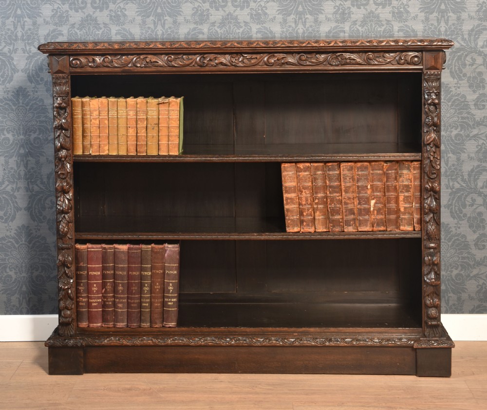 Carved oak open bookcase View III