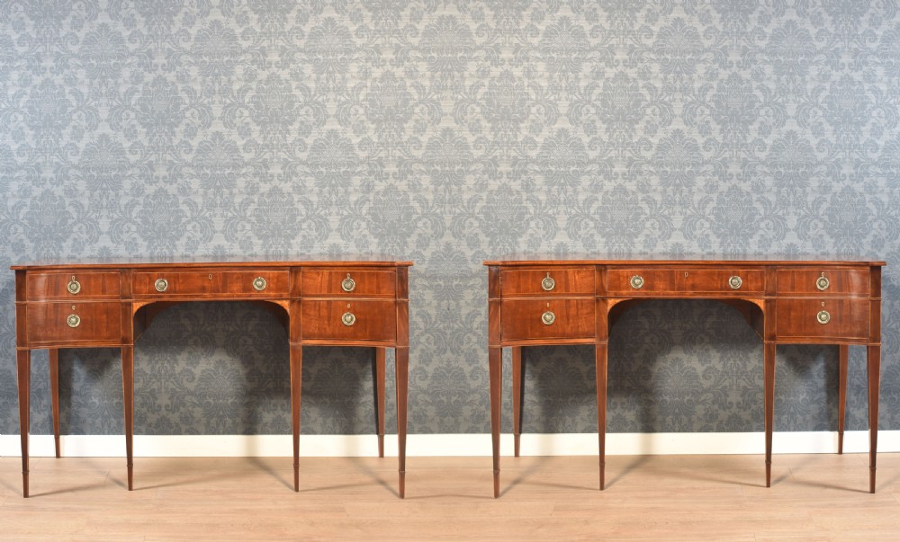 Pair of Mahogany concaved sideboards