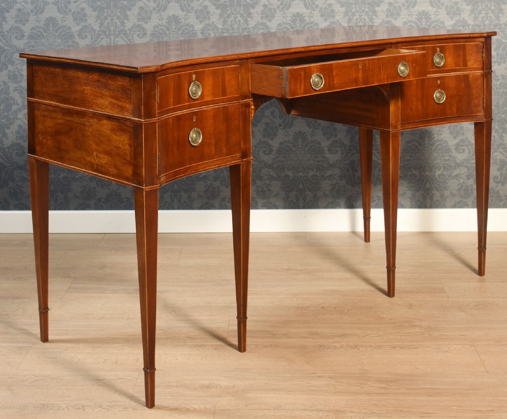Pair of Mahogany concaved sideboards View XIX