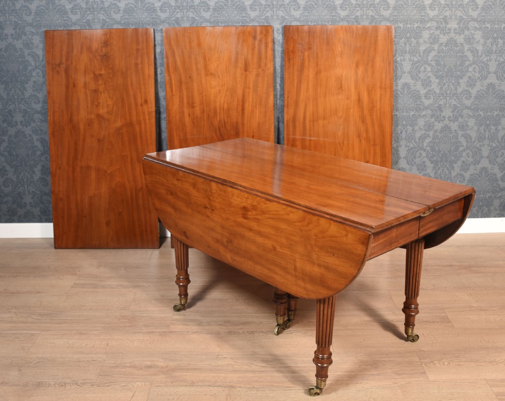 Mahogany extending dining table View XVI