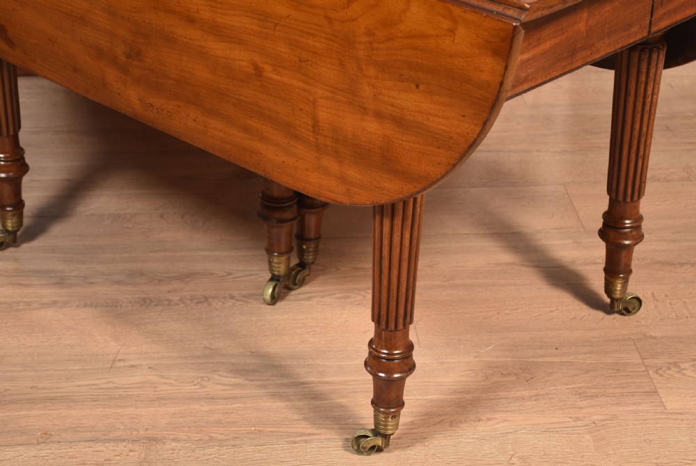 Mahogany extending dining table View XVII