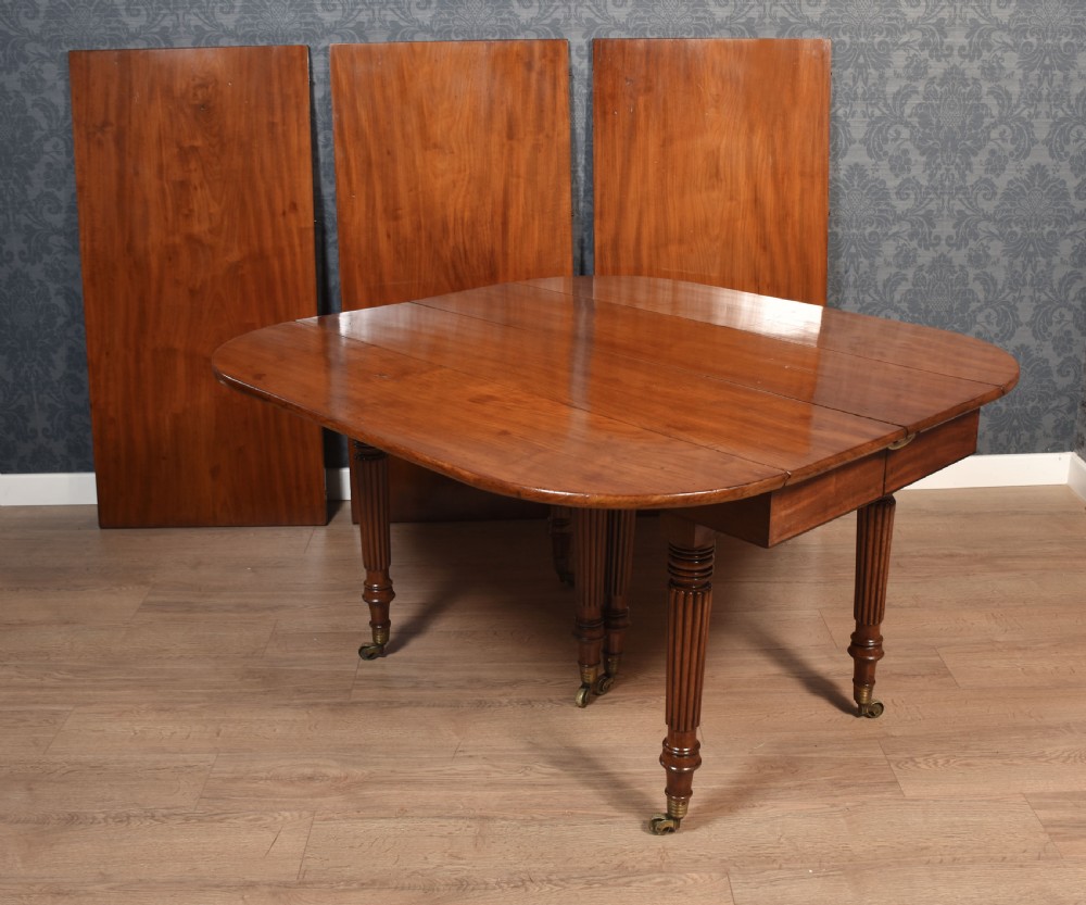 Mahogany extending dining table View XVIII