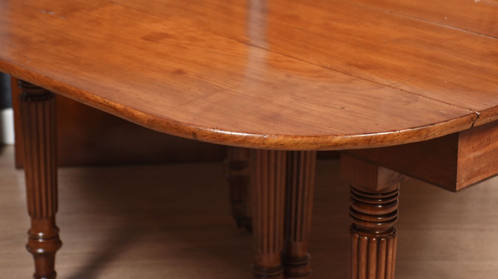 Mahogany extending dining table View XIX