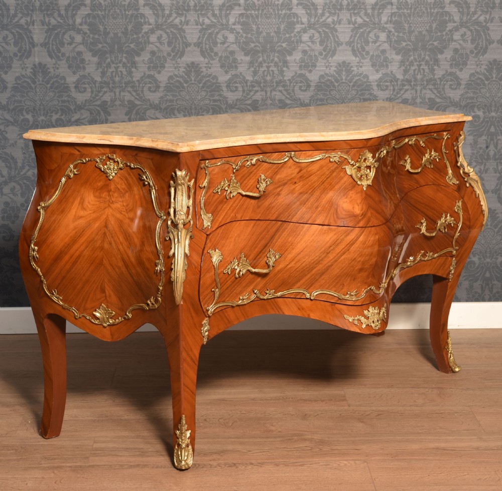 Louis XVI style walnut and gilt metal mounted two drawer commode