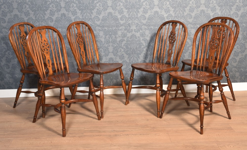 Set of six elm spindle back dining chairs