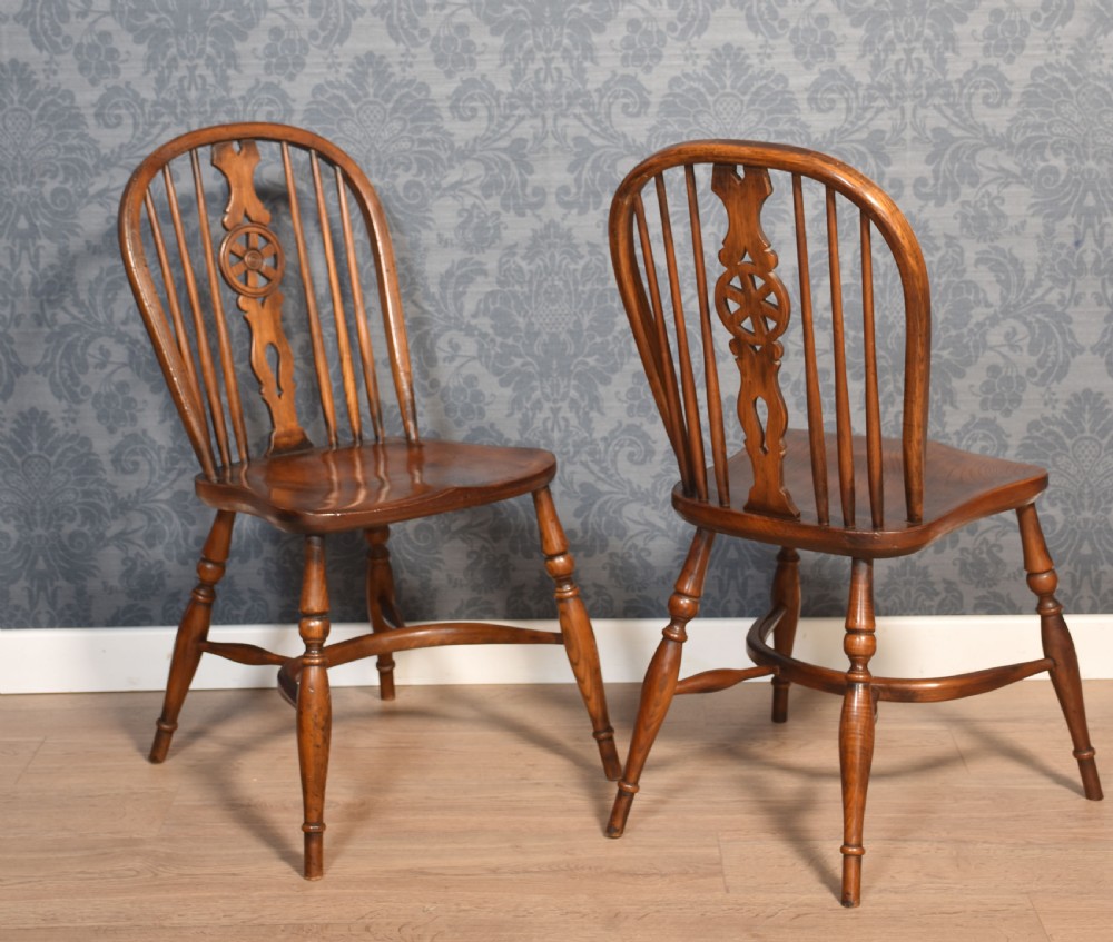 Set of six elm spindle back dining chairs View V