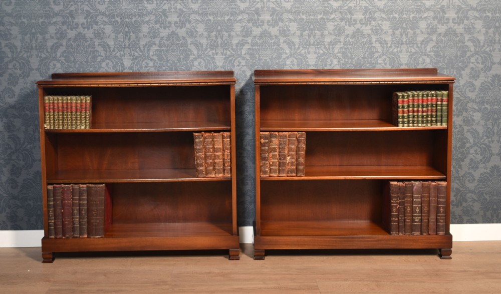 Pair of walnut open bookcases View III