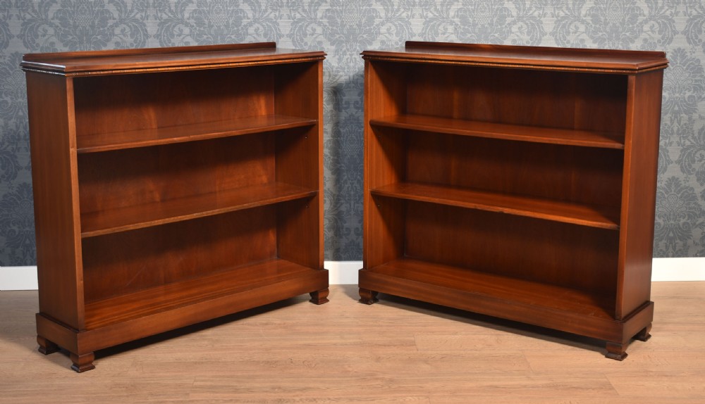 Pair of walnut open bookcases
