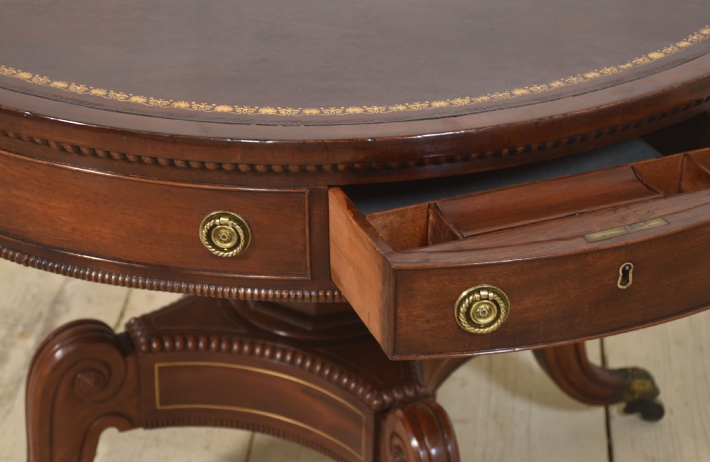 19th Century brass inlaid mahogany drum table View IX