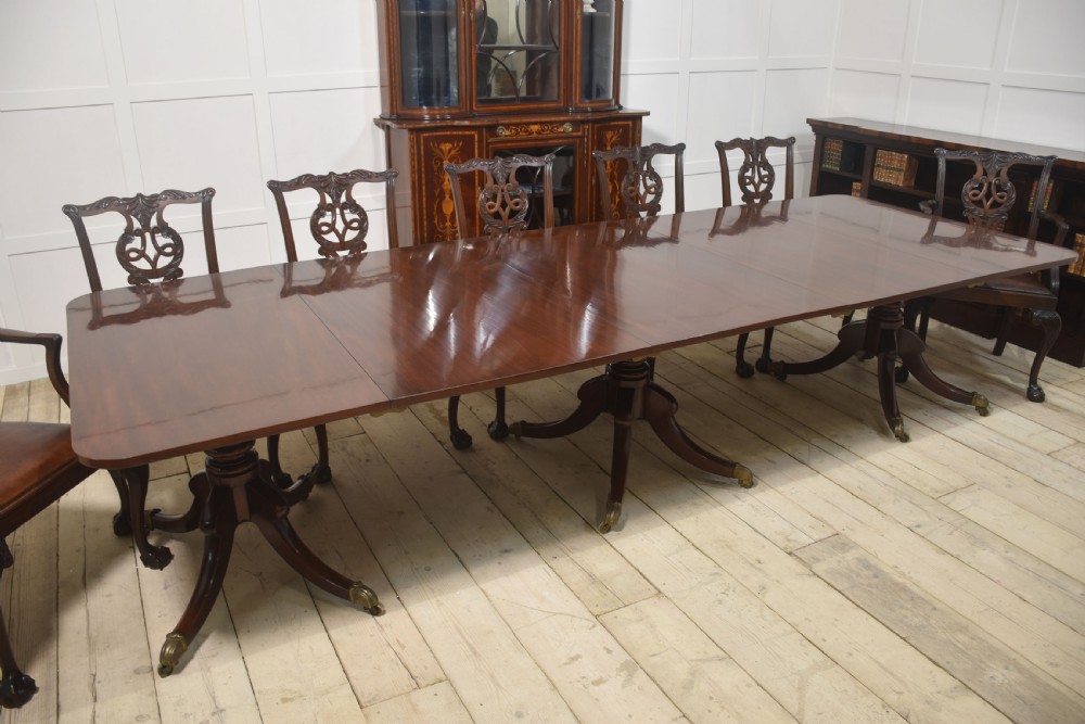 Regency mahogany triple pillar dining table View II