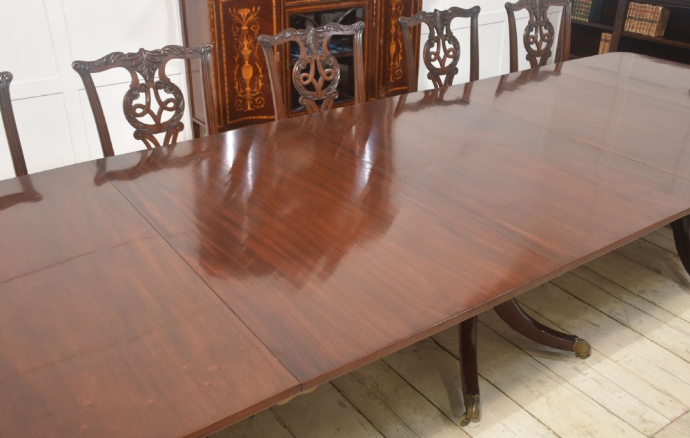 Regency mahogany triple pillar dining table View V