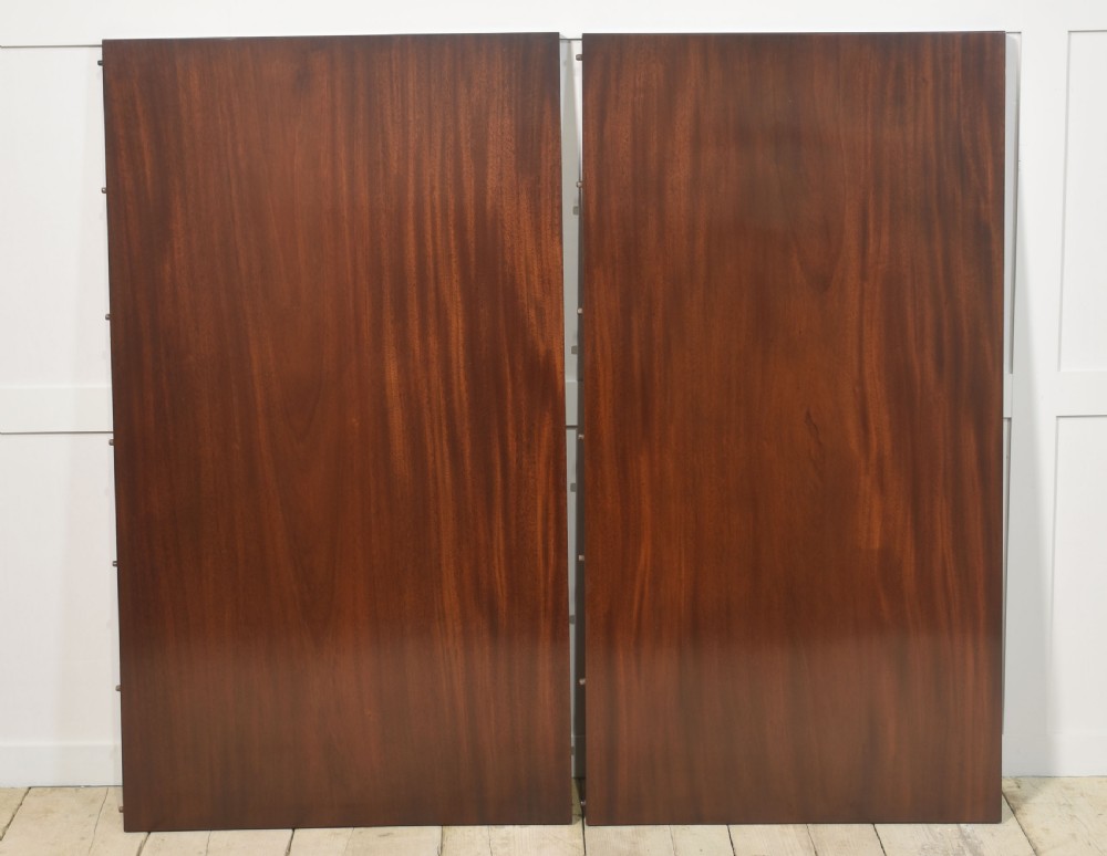 Regency mahogany triple pillar dining table View X