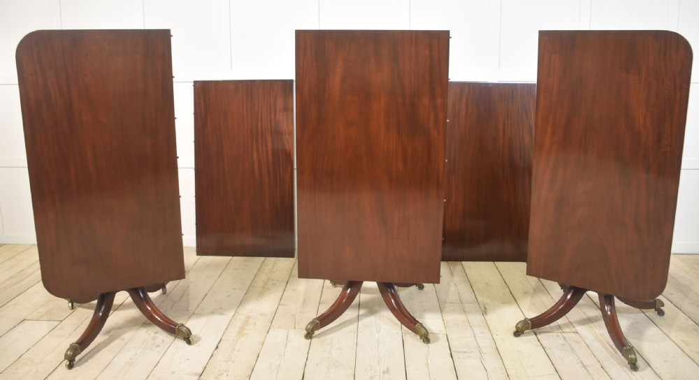Regency mahogany triple pillar dining table View XI