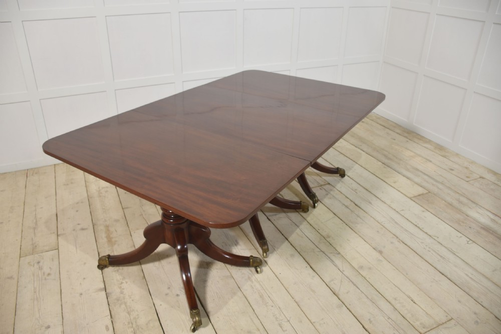 Regency mahogany triple pillar dining table View XIX