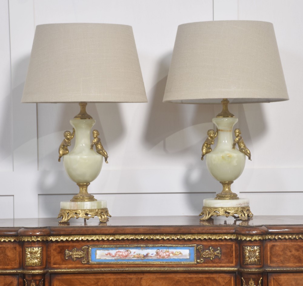 Pair of metal mounted onyx table lamps