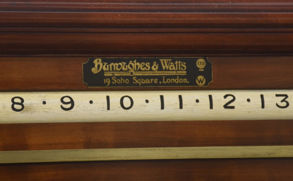 An antique Victorian mahogany billiard scoreboard featuring sliding colour pointers, a central slate panel, brass runners, and integrated ball compartments at the base. View VIII