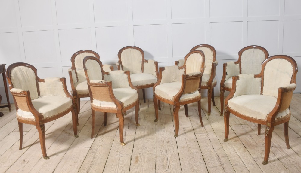 Set of eight walnut dining chairs