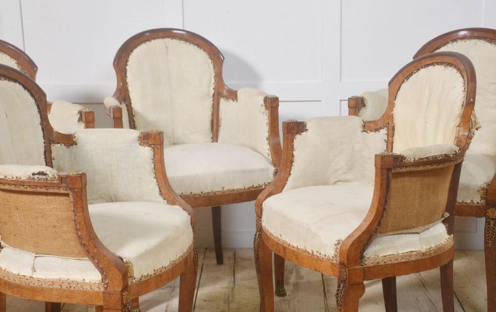 Set of eight walnut dining chairs View II