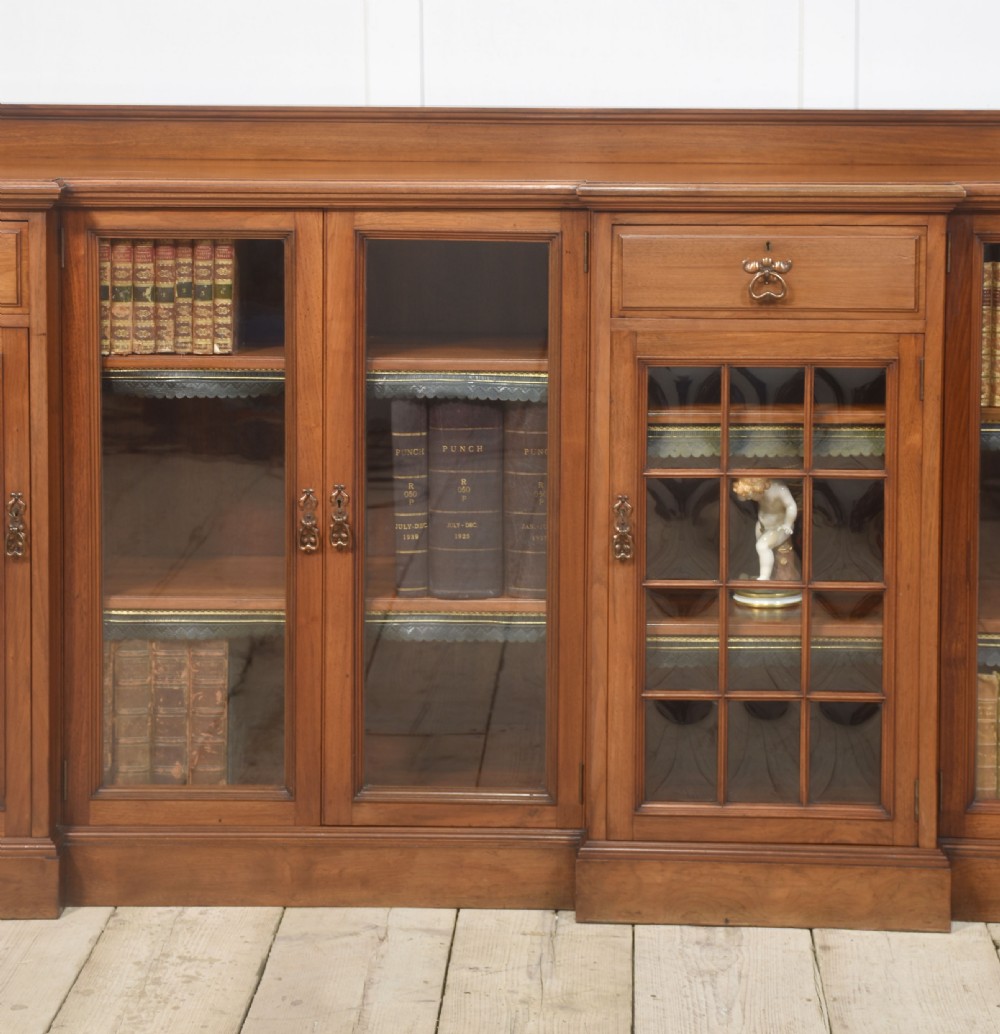 Large walnut breakfront low bookcase View III