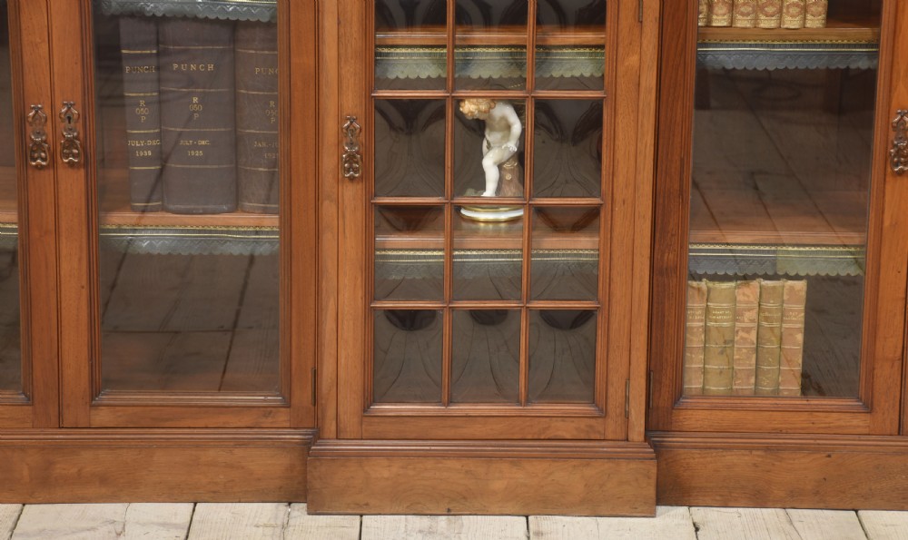 Large walnut breakfront low bookcase View VIII