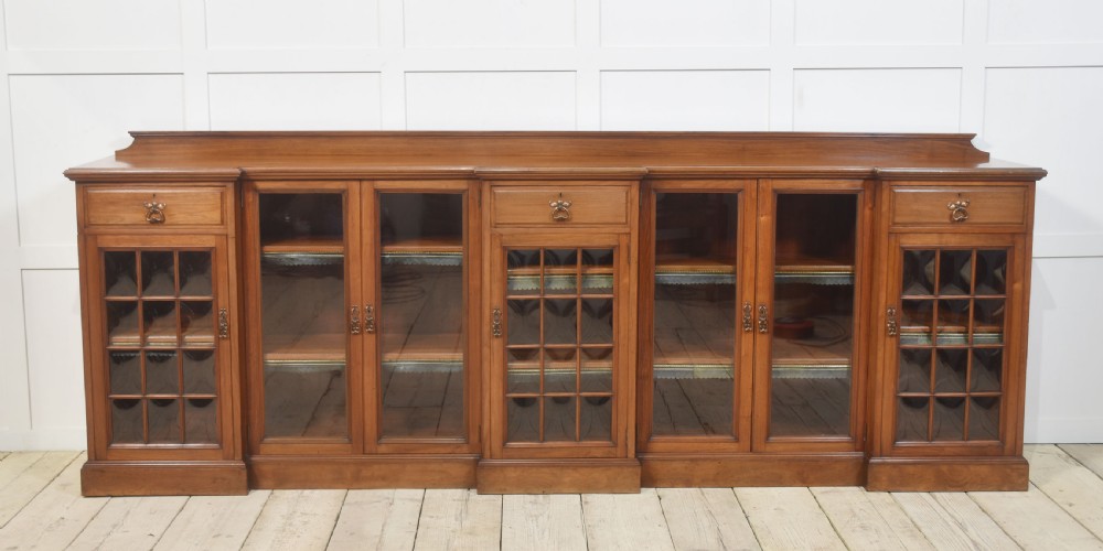 Large walnut breakfront low bookcase View IX