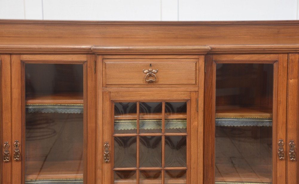 Large walnut breakfront low bookcase View X