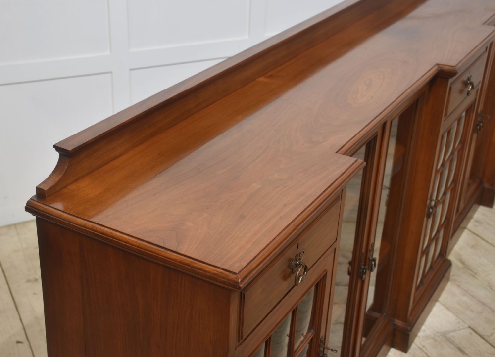 Large walnut breakfront low bookcase View XIV