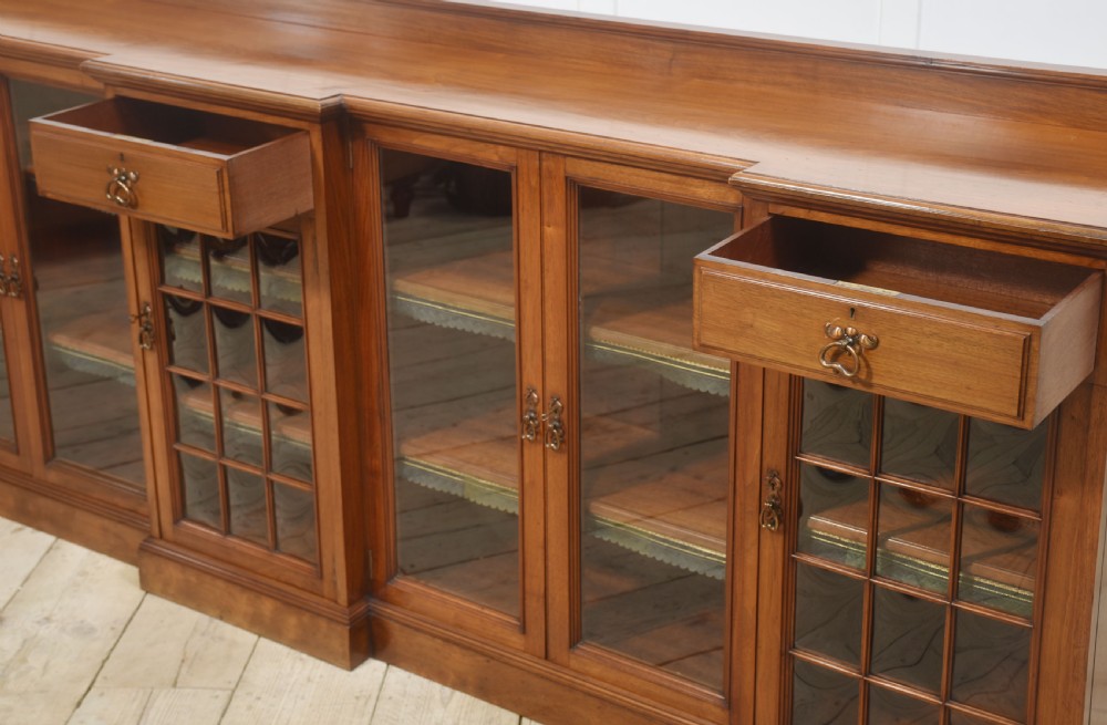 Large walnut breakfront low bookcase View XVII