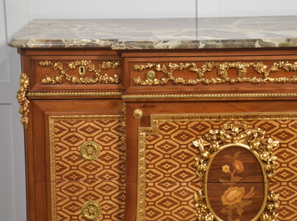 Italian inlaid and parcel gilt mahogany breakfront commode View V