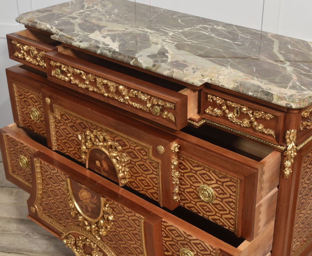 Italian inlaid and parcel gilt mahogany breakfront commode View XII