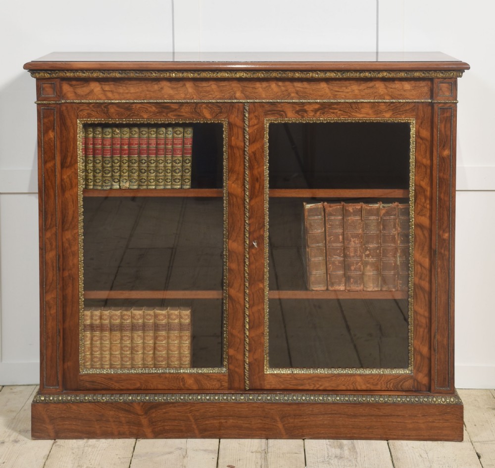 Rosewood two-door bookcase by Holland and sons