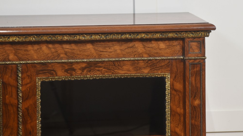 Rosewood two-door bookcase by Holland and sons View II