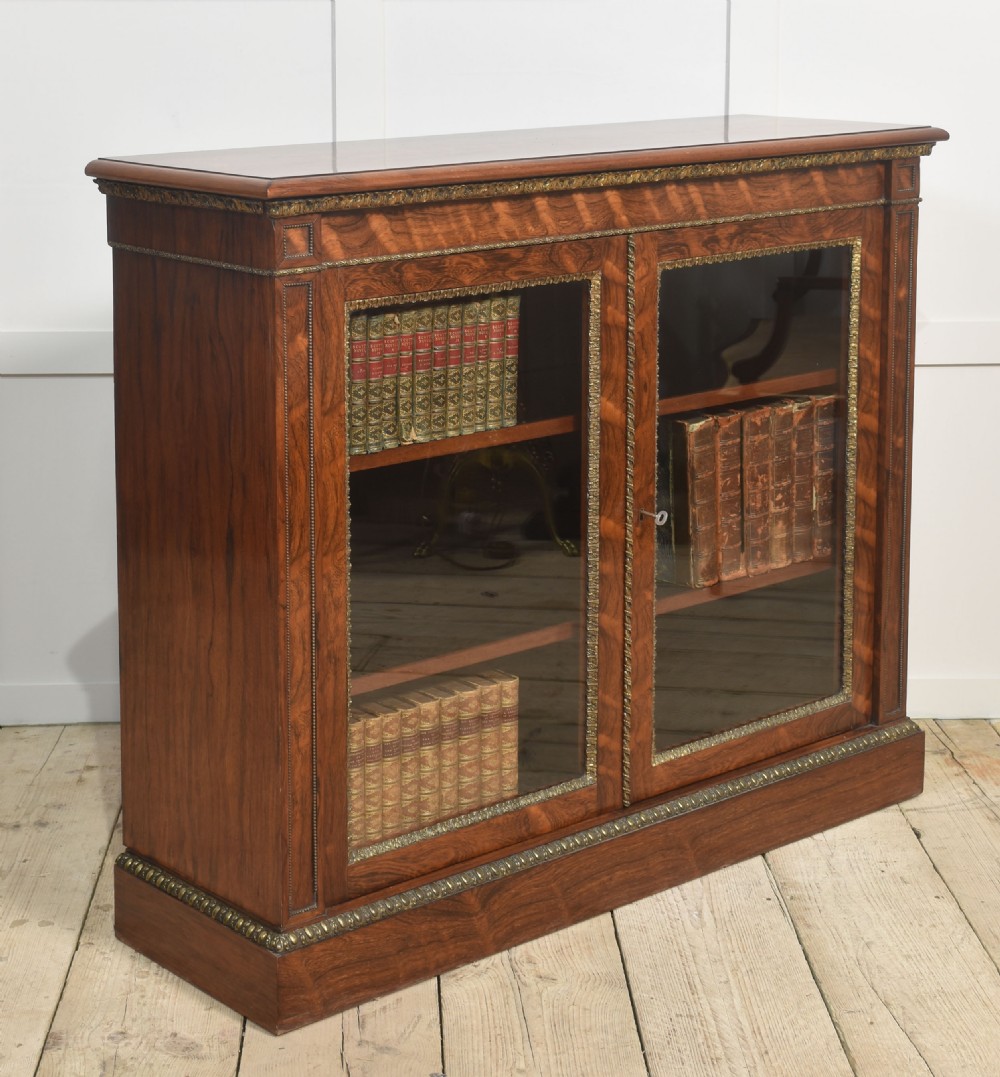 Rosewood two-door bookcase by Holland and sons View V