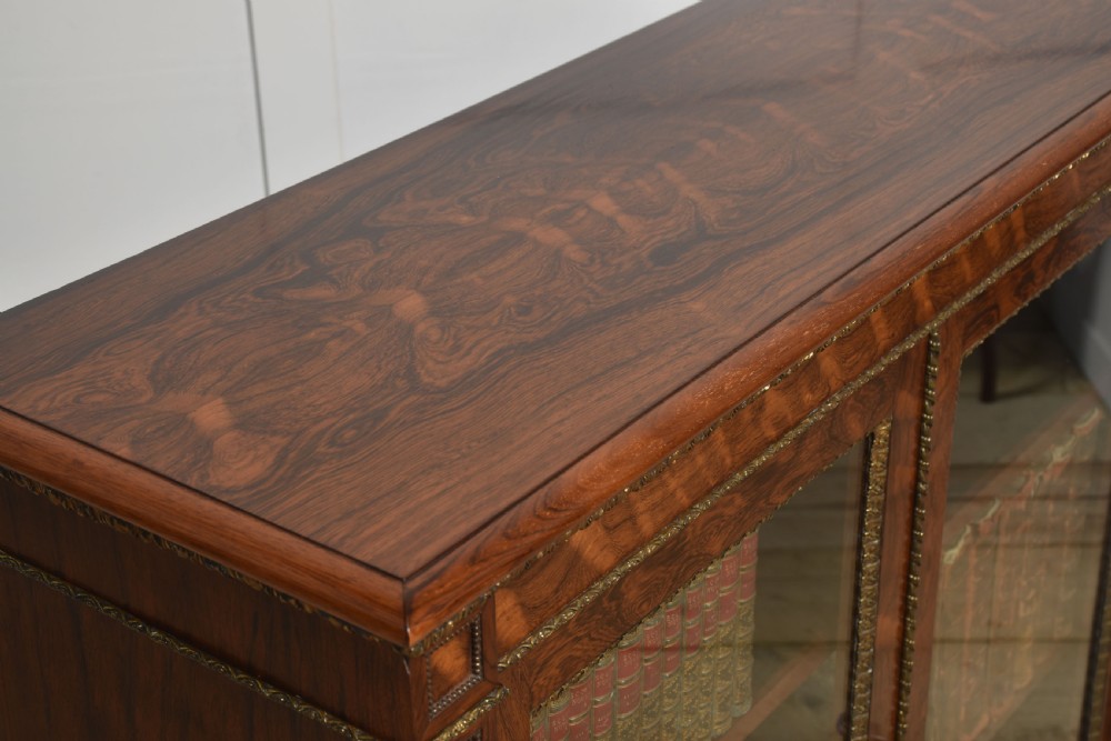Rosewood two-door bookcase by Holland and sons View VII