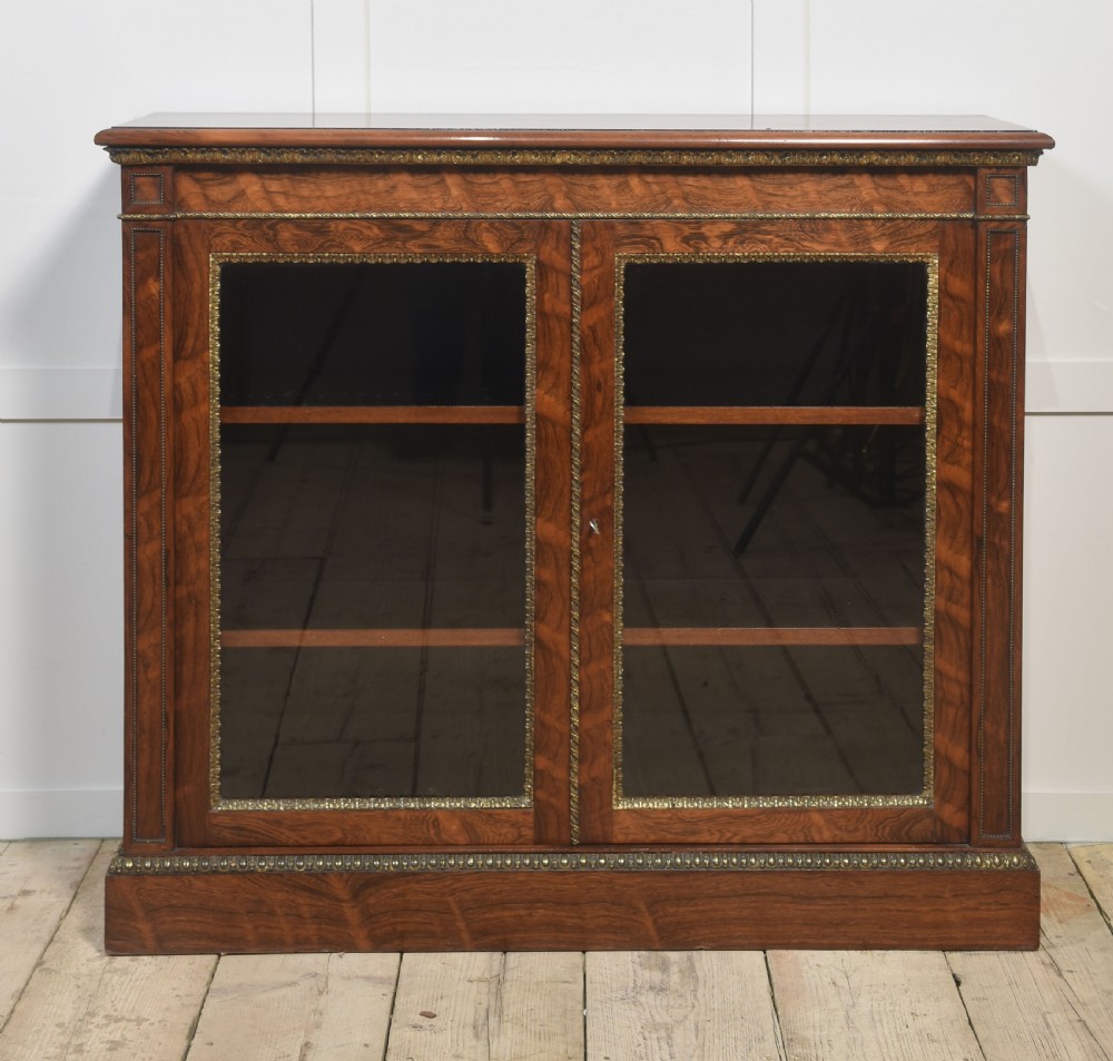 Rosewood two-door bookcase by Holland and sons View XI