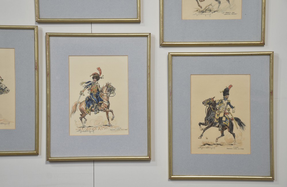 Set of five framed watercolour sketches depicting various military cavalry officers in detailed uniforms mounted on horseback. View III