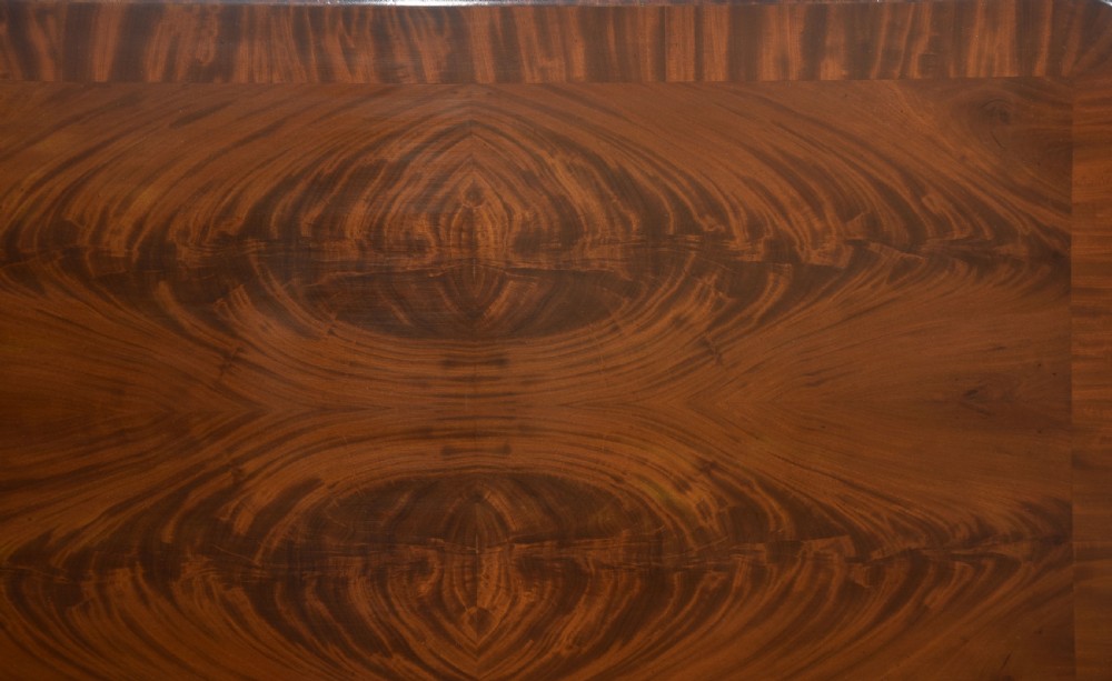 A Victorian mahogany centre table featuring a polished rectangular top with rounded corners, trestle end supports, a spiral-turned stretcher, and scroll feet on castors. View XIV