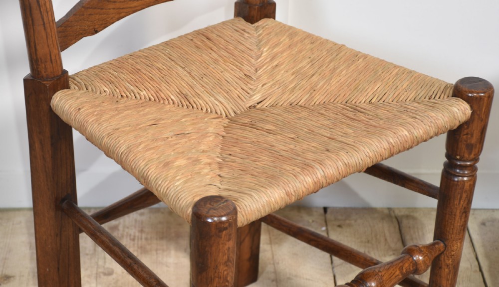 Set of six oak ladder back dining chairs View VI