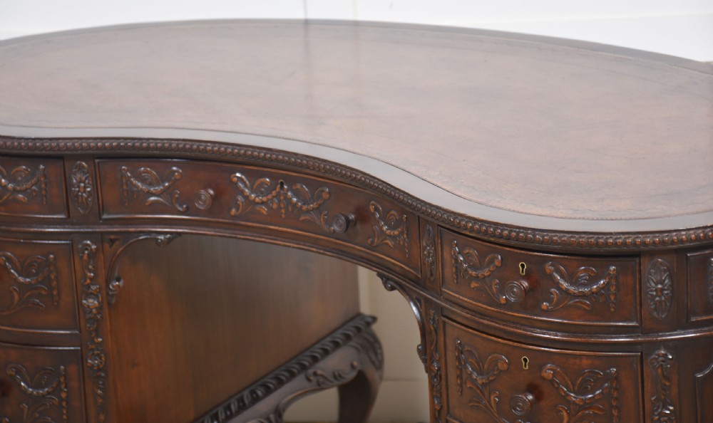 Carved mahogany kidney shaped desk View VII