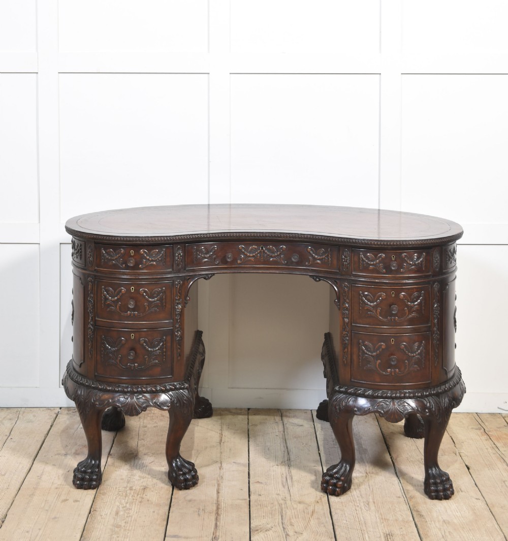 Carved mahogany kidney shaped desk View IX