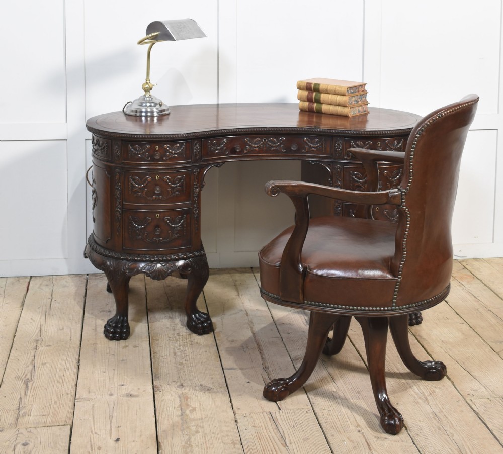 Carved mahogany kidney shaped desk View XVI