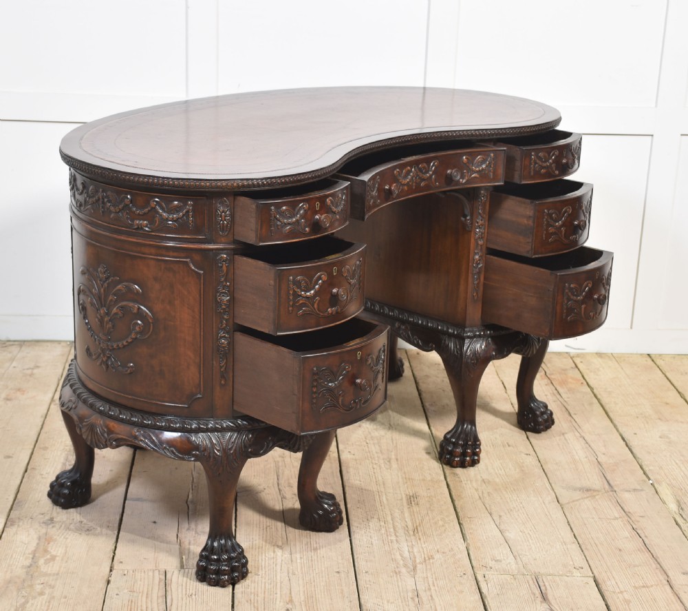 Carved mahogany kidney shaped desk View XIX