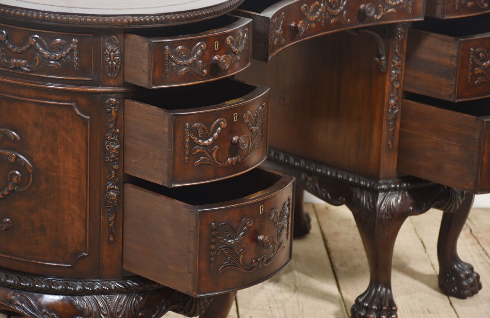 Carved mahogany kidney shaped desk View XX