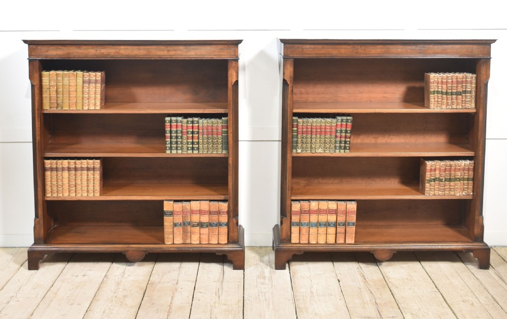 Pair of walnut inlaid bookcase