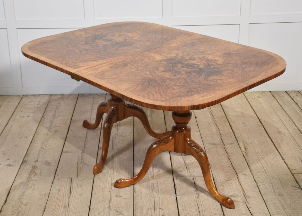 Regency style walnut twin pillar dining table View V
