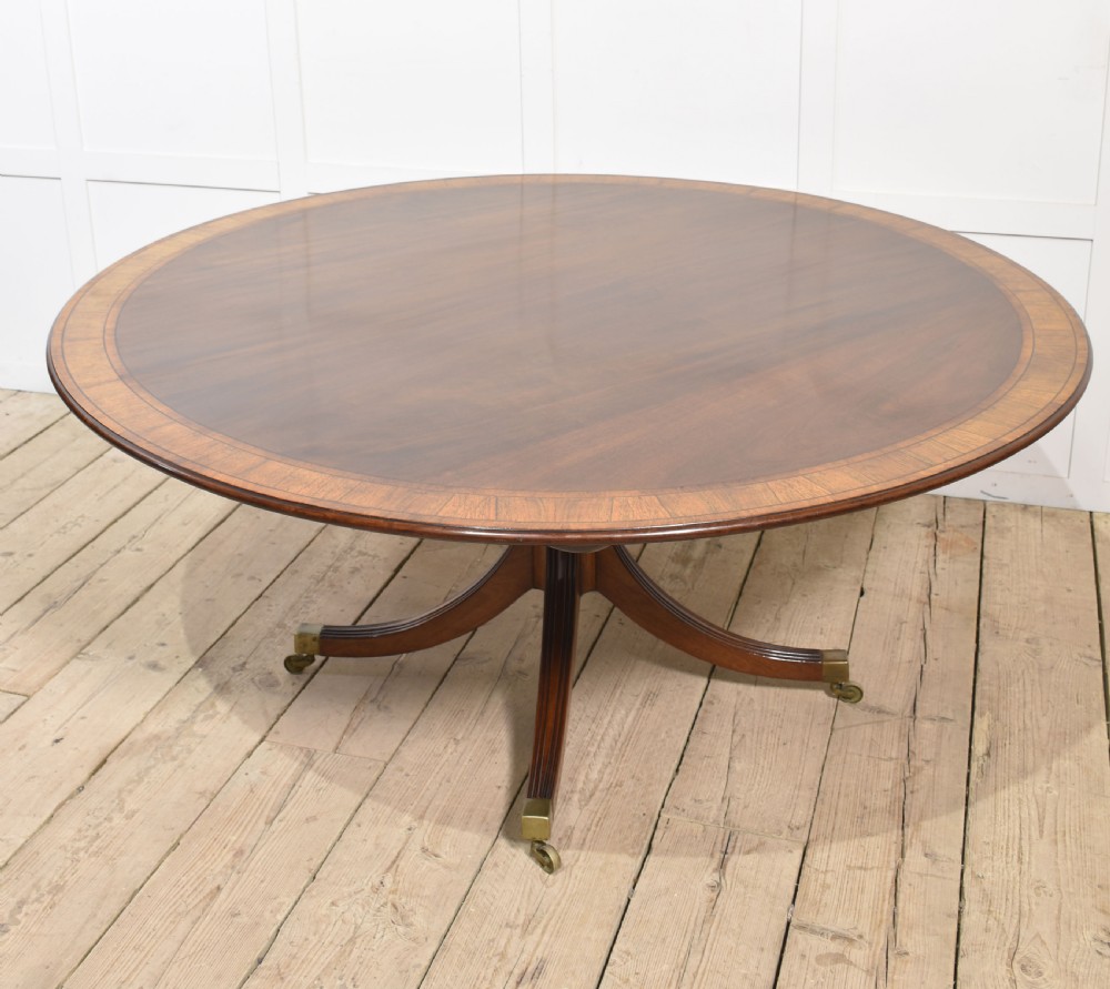 Mahogany cross banded circular dining table