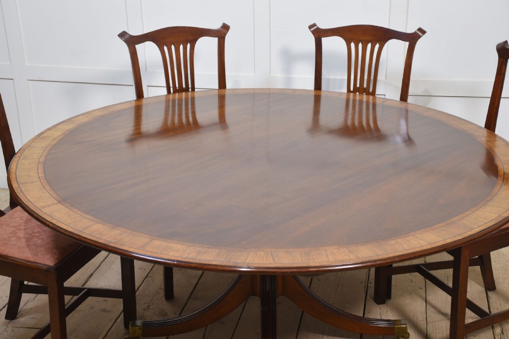 Mahogany cross banded circular dining table View VIII