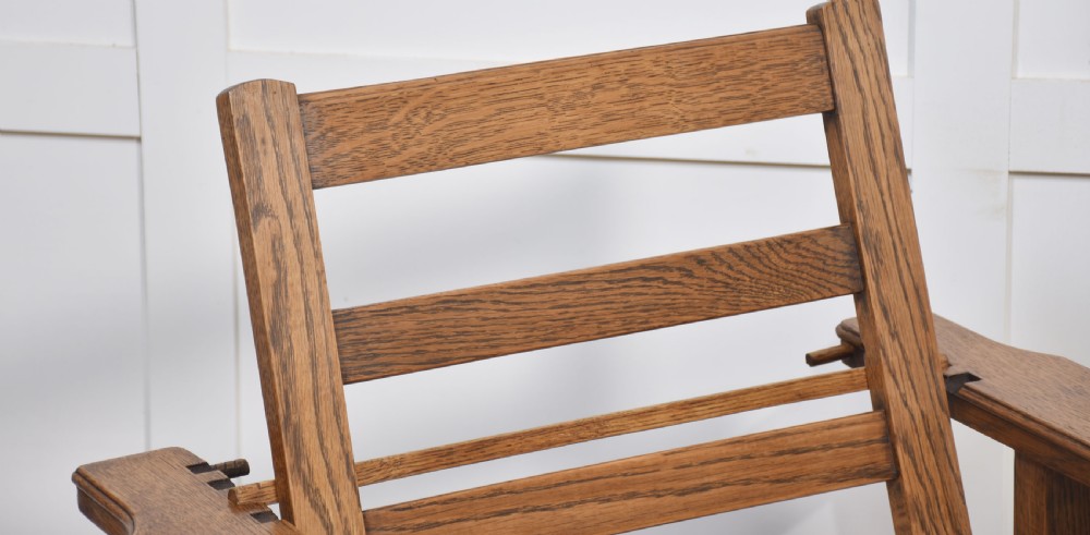 Pair of oak reclining armchairs View III