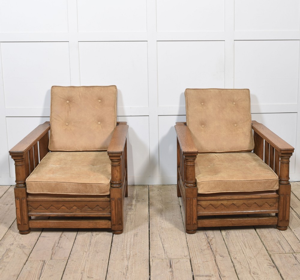 Pair of oak reclining armchairs View X